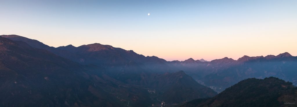 Mountains under moon in morning